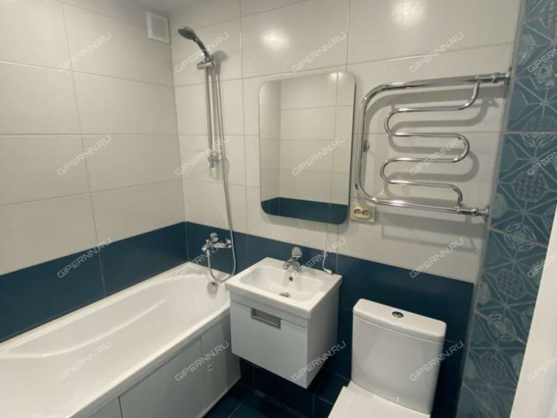 трёхкомнатная квартира в 3-м микрорайоне дом 16 город Кстово